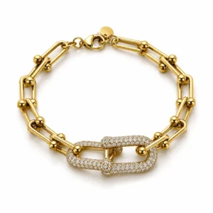 Bracelet chaîne maillons étrier U-link avec boucle centrale pavée de strass en acier inoxydable doré
